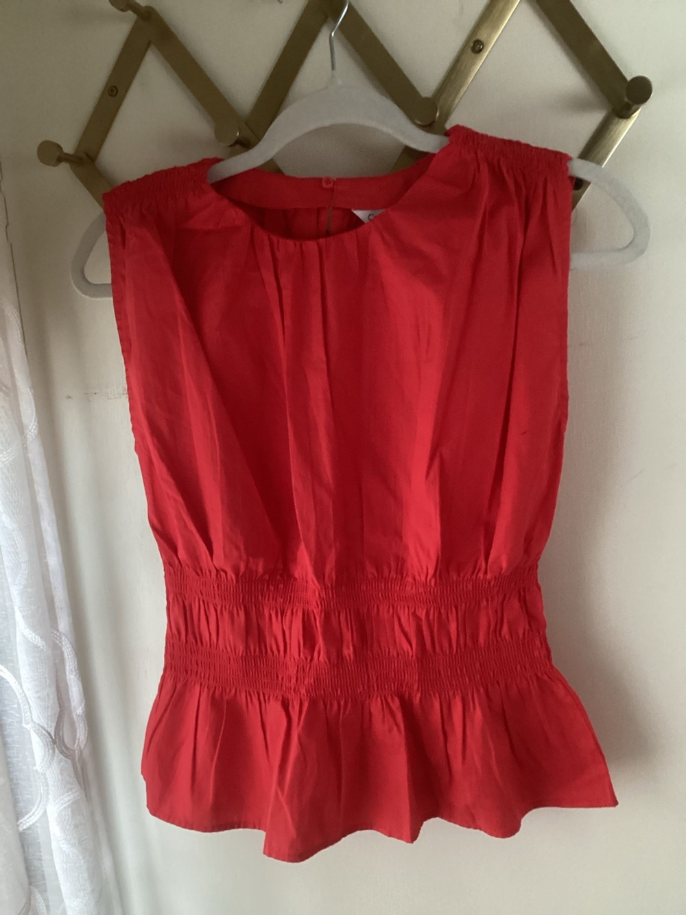 Calvin Klein Coral-Red Sleeveless Smocked Waist Peplum Top